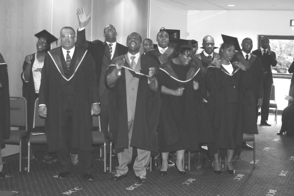 BIBS students and faculty singing together at a graduation service